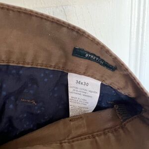 Brand: Perry Ellis(stretch) Color: Brown khaki material 
Size: 36/30